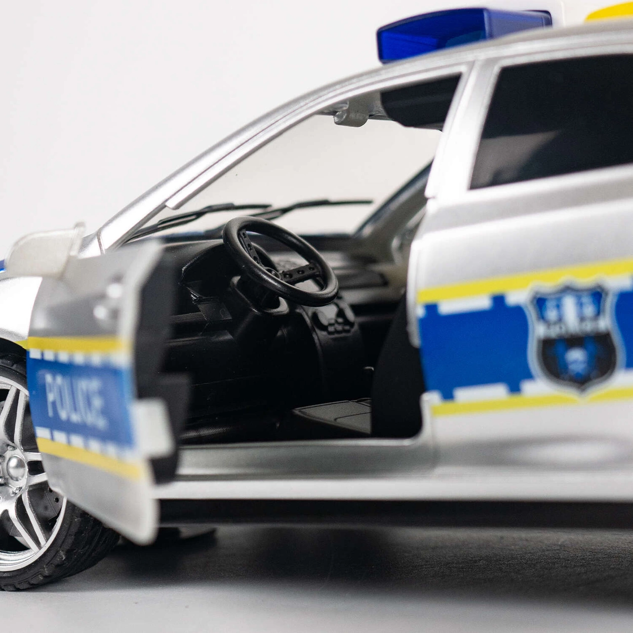 Auto Policyjne Srebrne Police Car Toystar 666-22Q w skali 1:14